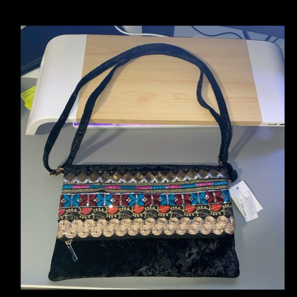 Elegant fashion purse, black velvet with colorful embroidered designs, bag